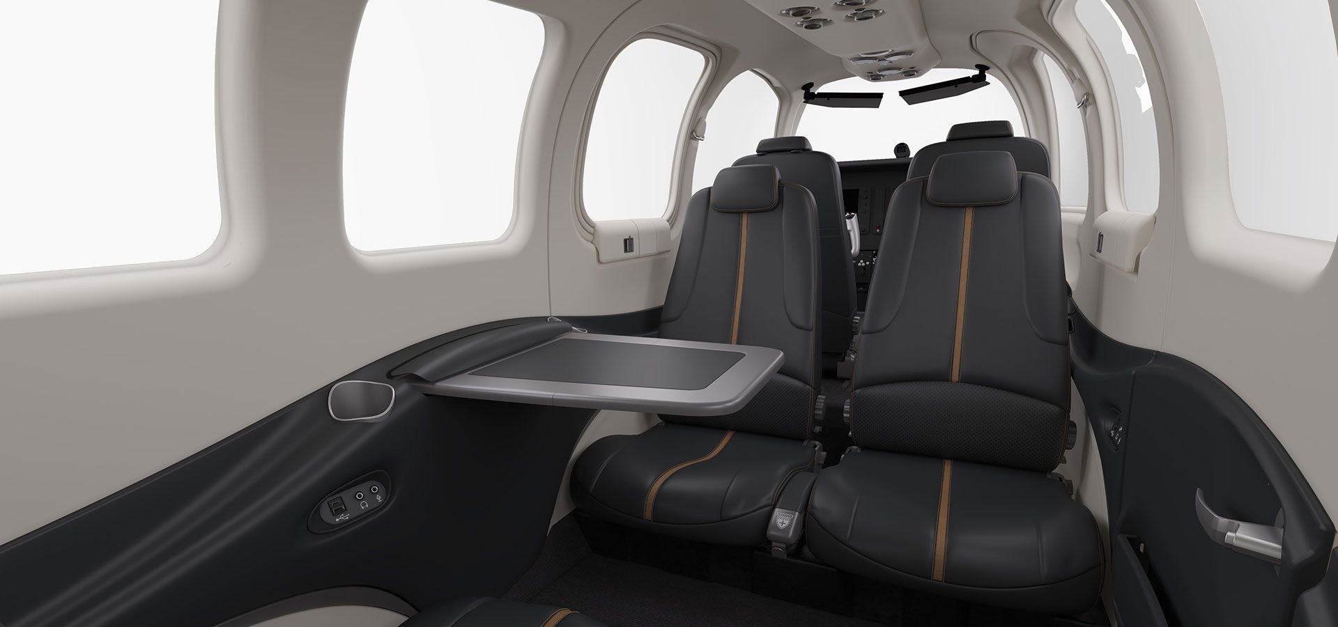 Beechcraft Bonanza G36 cabin — club leather seating looking forward to the Garmin glass cockpit
